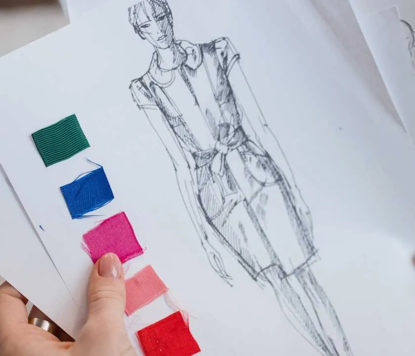 A fashion design sketch and a colour swatch